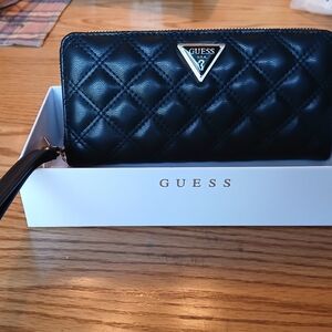 NWT And Gift Box Guess Black Quilted Zip Wallet With 7" Wrist Strap.